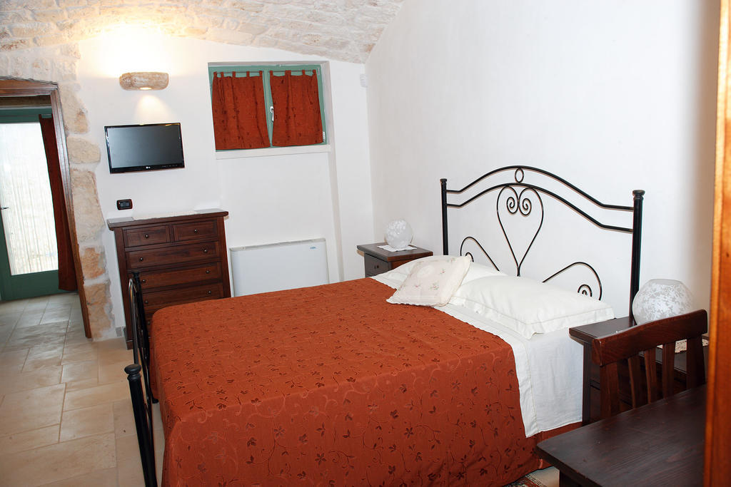 Trulli Boccadoro Hotel Ostuni Værelse billede